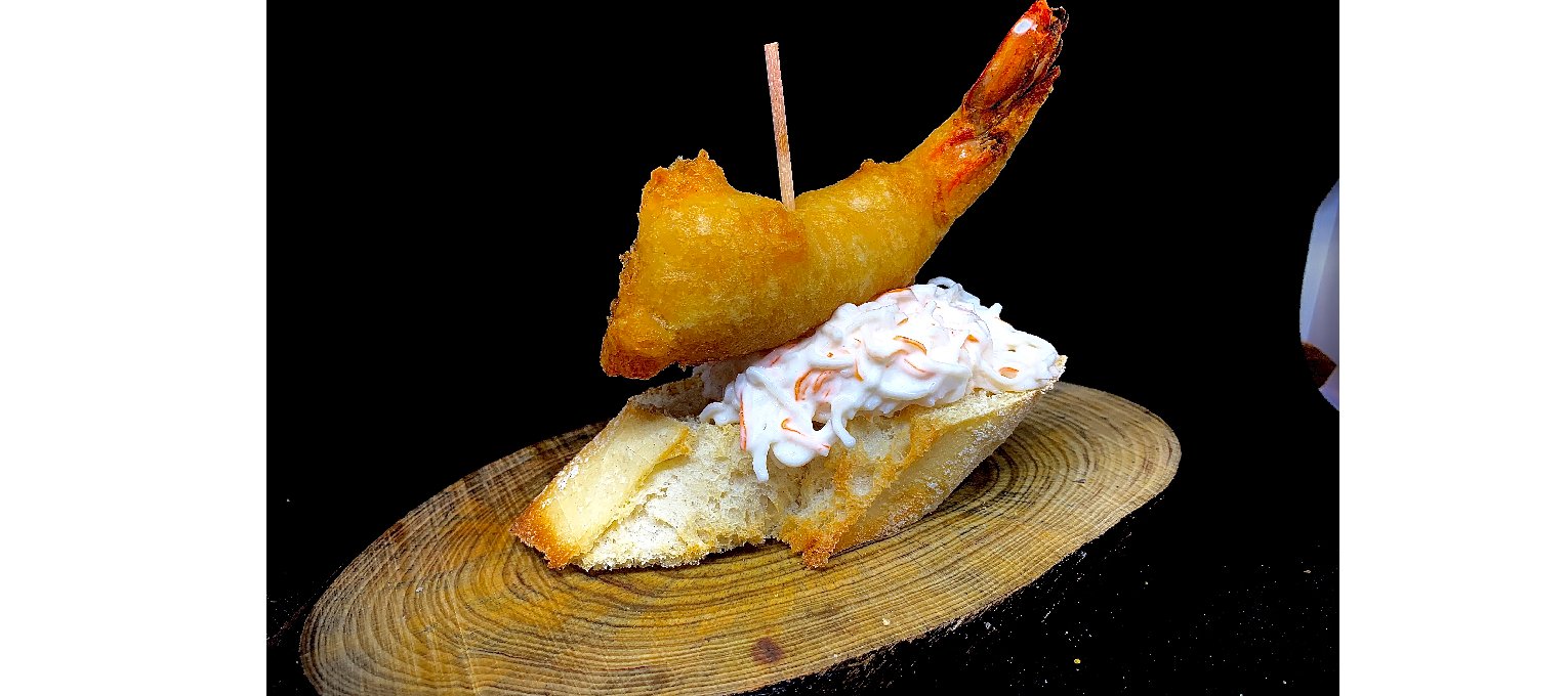 Pintxo de txaka con langostino tempura.