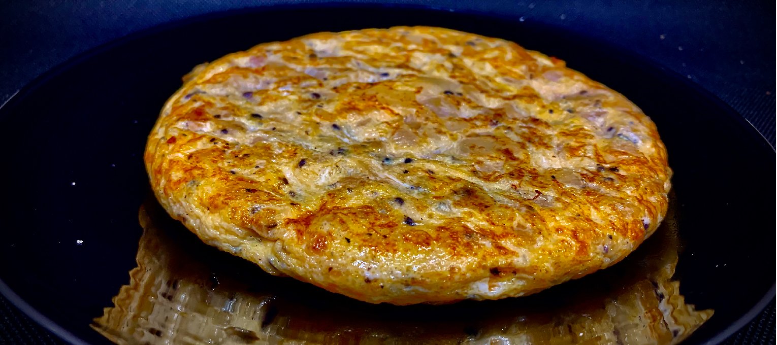 Tortilla de patata trufada individual.